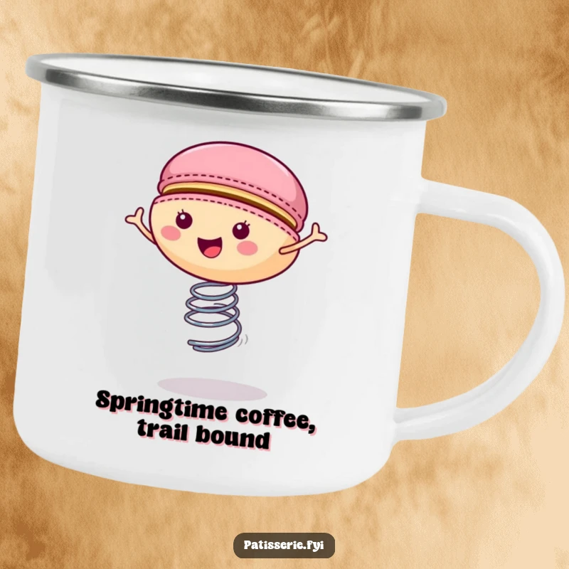 Funny macaron camping mug showing a happy cookie bouncing on a spring, perfect for a cheerful outdoor beverage.