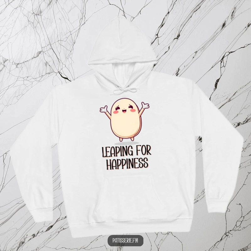 Funny Macaron Hoodie displaying a gleeful macaron character in a joyful leap, arms spread wide, radiating pure, unadulterated happiness.