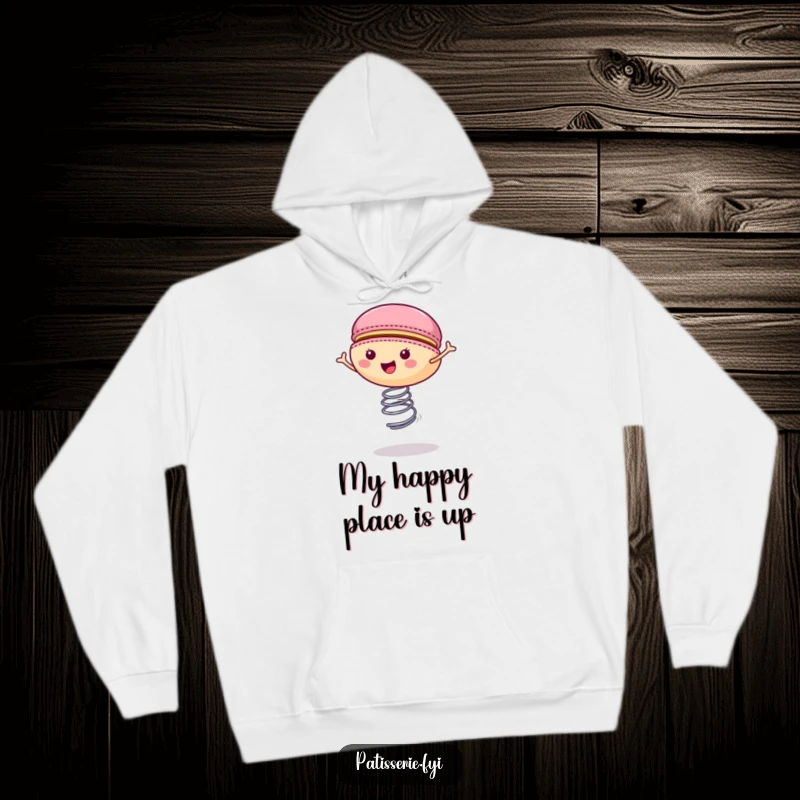 Funny macaron hoodie featuring a happy cookie bouncing on a spring, offering warmth and cheerful vibes.